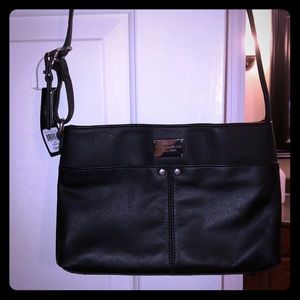 Tignanello black genuine leather crossbody purse.